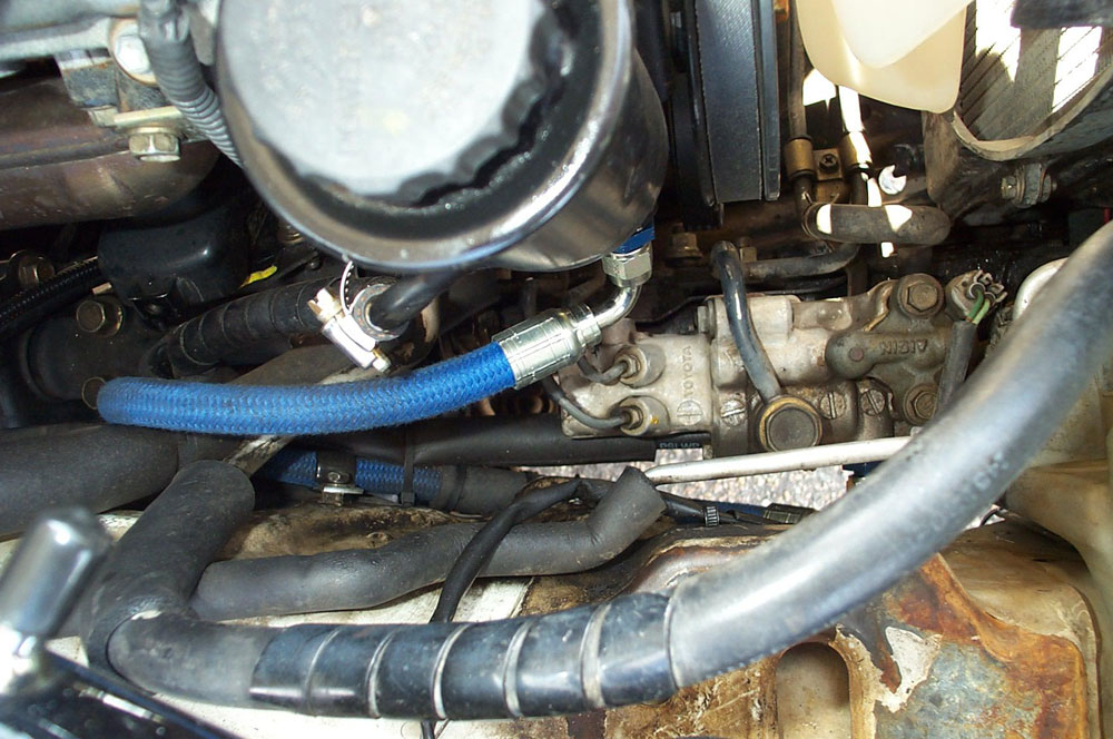 PS hose installed at pump on ABS model
